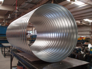 Spiral Pipe | We fabricate our own spiral pipe and fittings in both single and double wall configurations. This allows us to drastically reduce the time for fabrication and installation on your project.