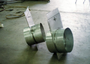 Dampers | Stainless steel dampers fabricated for us in an exhaust system.